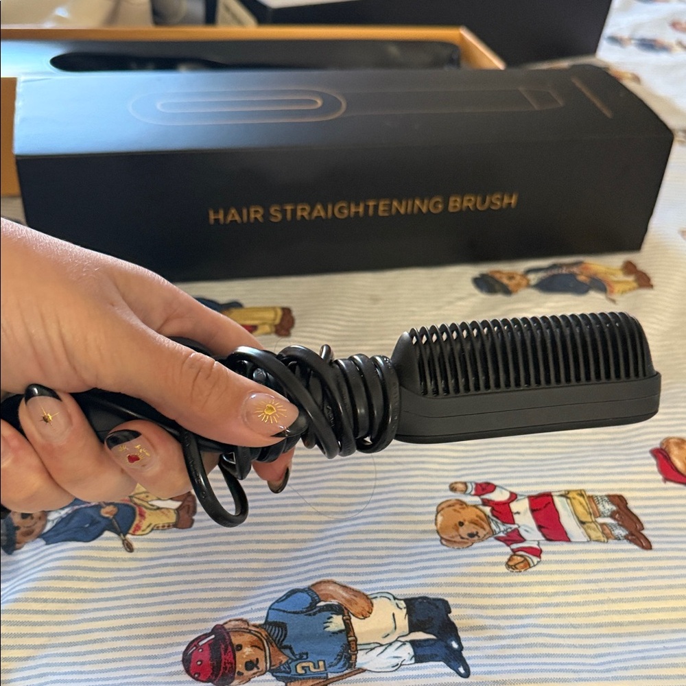 Sleek Black and Gold Hair Straightening Brush